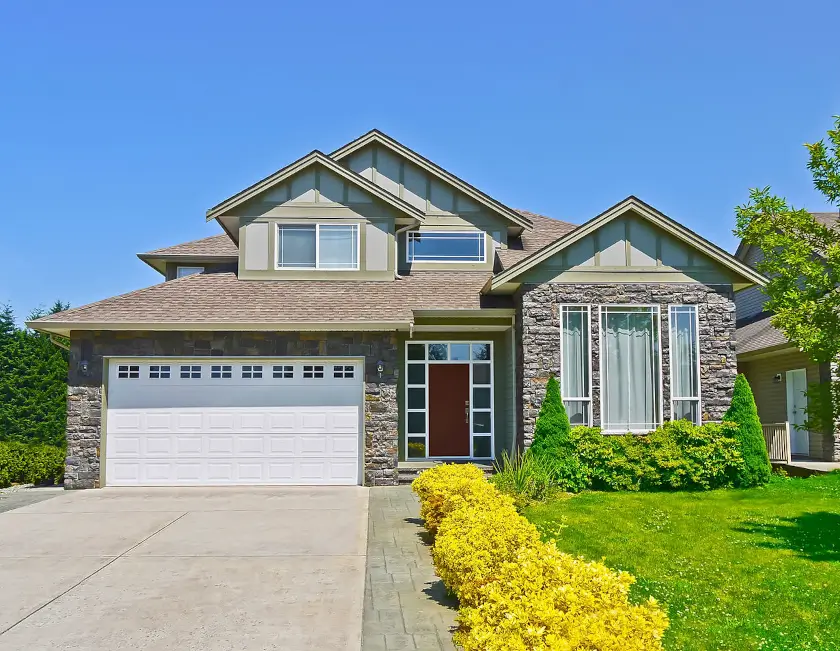 Modern Home with Installed Cultured Stone, Garage Doors, Vinyl Siding, Gutters, Roofing, Entry Doors, Windows. Have your home renovated to maximize curb appeal, let our installers and contractors renovate your Ohio or Pennsylvania home!