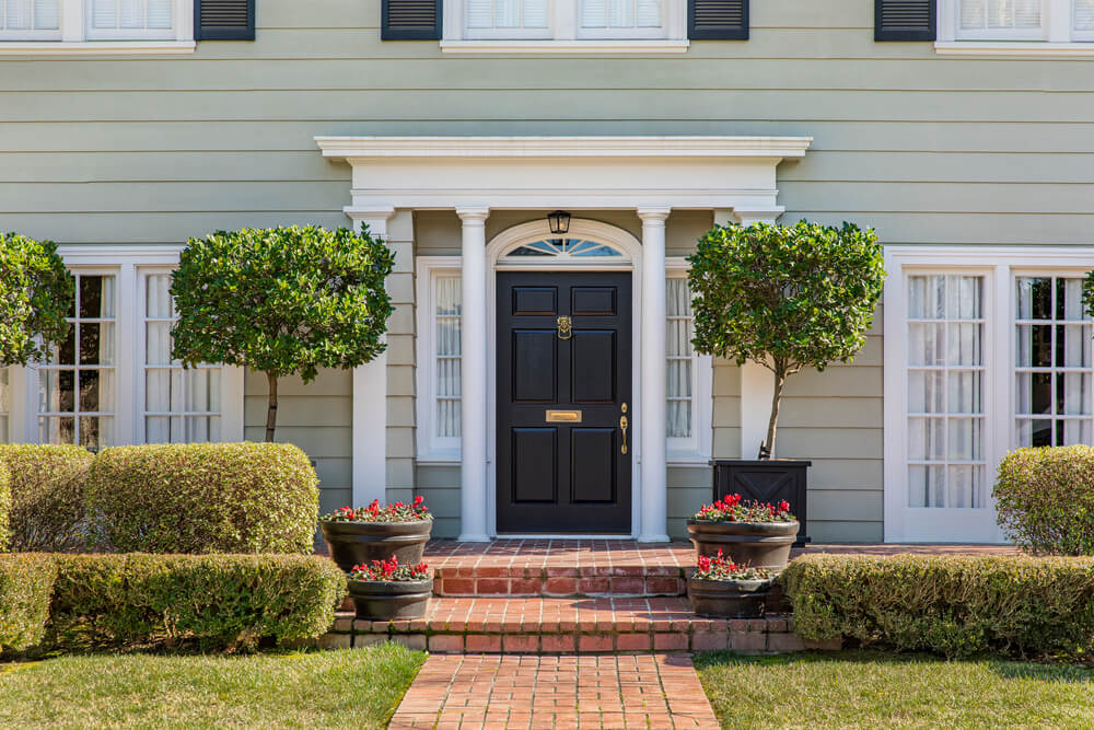 Front,Door,Of,Classic,Home,With,Landscaped,Front,Yard,And