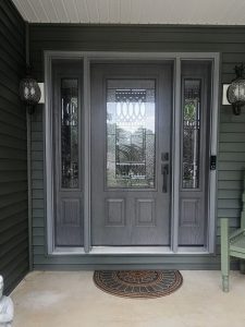 Wooden entry door with black accents